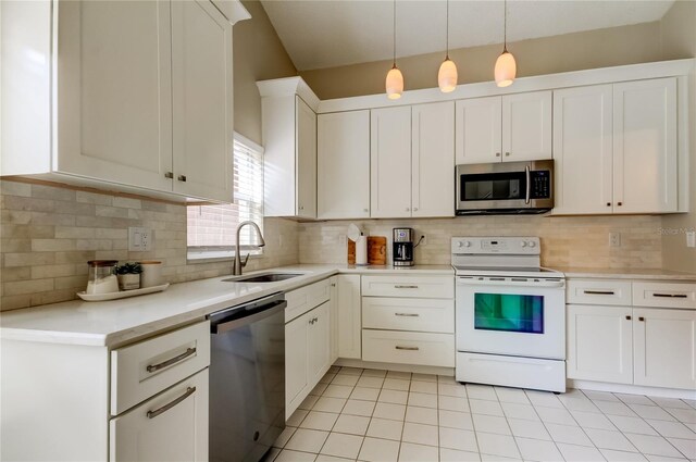 11641 Branch Mooring Dr, Tampa, FL 33635 - kitchen with appliances with stainless steel finishes, a sink, light countertops, backsplash, and white cabinets