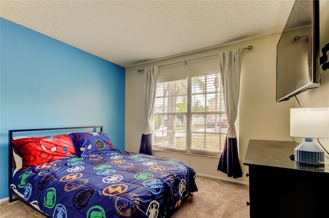 11641 Branch Mooring Dr, Tampa, FL 33635 - carpeted bedroom with a textured ceiling and baseboards