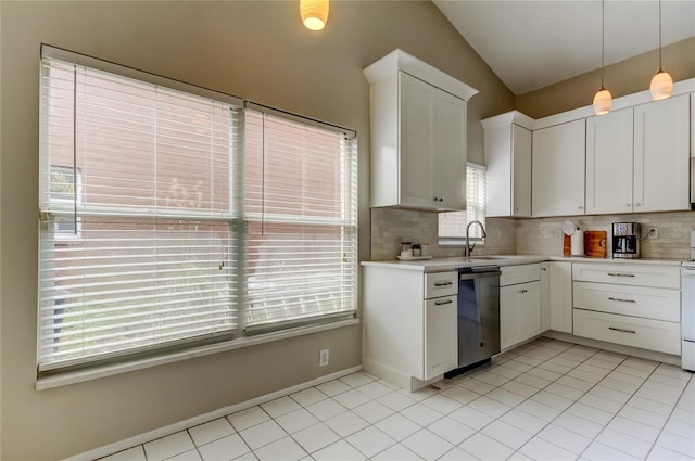 11641 Branch Mooring Dr, Tampa, FL 33635 - kitchen featuring dishwasher, backsplash, light countertops, a sink, and vaulted ceiling