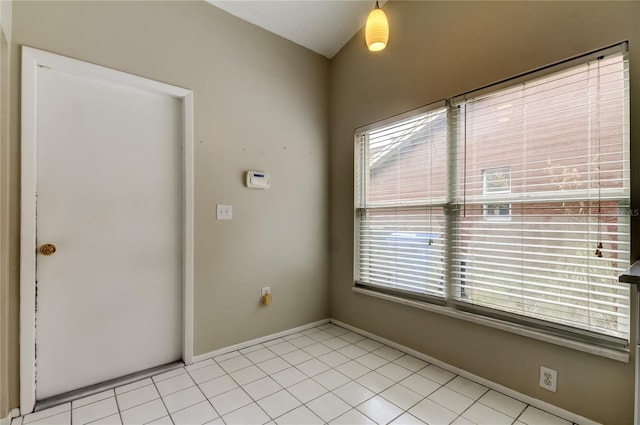 11641 Branch Mooring Dr, Tampa, FL 33635 - spare room featuring baseboards and light tile patterned floors