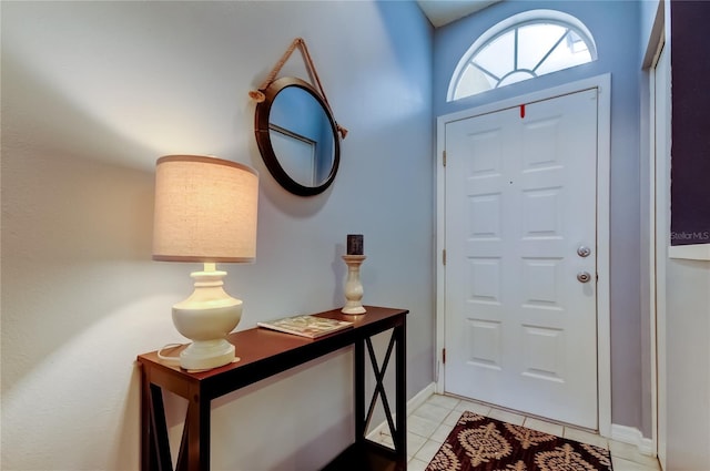 11641 Branch Mooring Dr, Tampa, FL 33635 - entryway with light tile patterned floors and baseboards