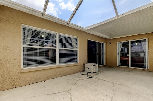 11641 Branch Mooring Dr, Tampa, FL 33635 - view of patio / terrace featuring glass enclosure