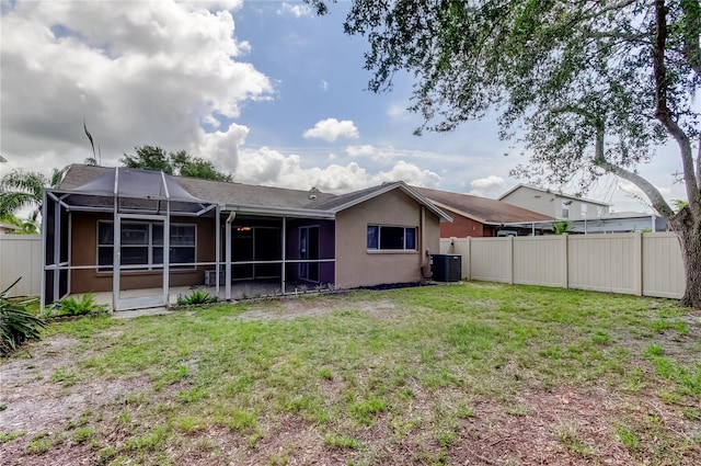 11641 Branch Mooring Dr, Tampa, FL 33635 - rear view of house featuring stucco siding, cooling unit, and a lanai