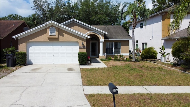 11641 Branch Mooring Dr, Tampa, FL 33635 - view of front of property featuring stucco siding, an attached garage, concrete driveway, and a front lawn