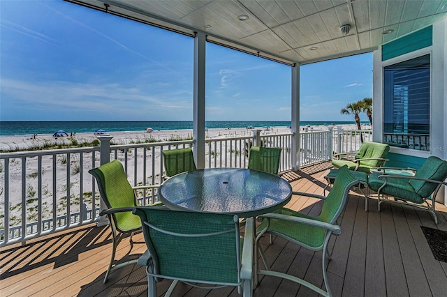 13303 Gulf Ln, Madeira Beach, FL 33708 - wooden deck with view of water and beach