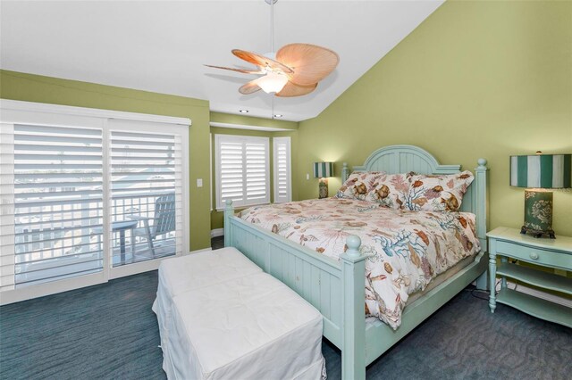 13303 Gulf Ln, Madeira Beach, FL 33708 - bedroom with access to exterior, dark carpet, vaulted ceiling, and a ceiling fan