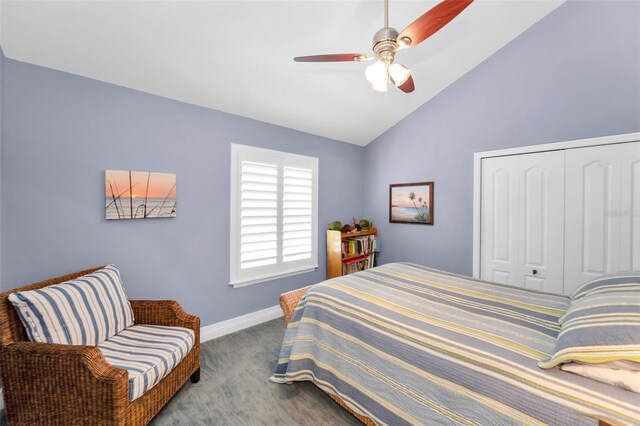 13303 Gulf Ln, Madeira Beach, FL 33708 - bedroom featuring carpet, lofted ceiling, a closet, baseboards, and ceiling fan