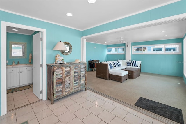13303 Gulf Ln, Madeira Beach, FL 33708 - living room with ornamental molding, recessed lighting, light carpet, light tile patterned floors, and a ceiling fan