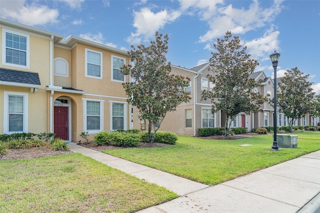 6920 Towering Spruce Dr, Riverview, FL 33578 - multi unit property featuring stucco siding and a front yard