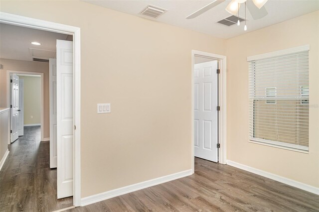6920 Towering Spruce Dr, Riverview, FL 33578 - spare room featuring wood finished floors, ceiling fan, and baseboards