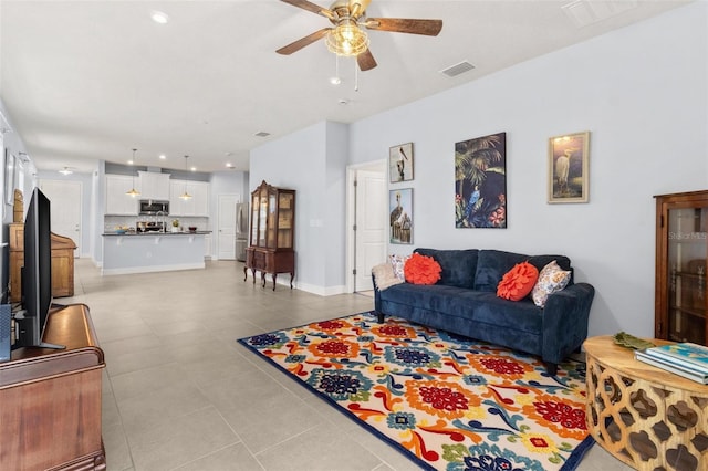 10945 High Noon Trl, Parrish, FL 34219 - living room featuring light tile patterned floors, ceiling fan, and recessed lighting