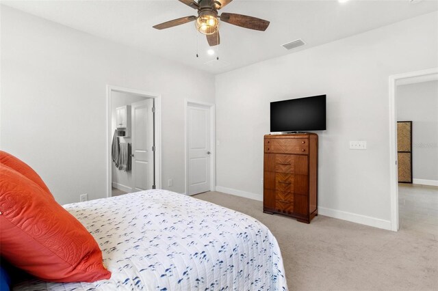 10945 High Noon Trl, Parrish, FL 34219 - bedroom featuring light colored carpet, baseboards, a ceiling fan, and recessed lighting