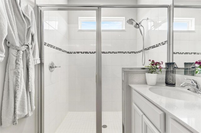 10945 High Noon Trl, Parrish, FL 34219 - bathroom featuring vanity and a stall shower