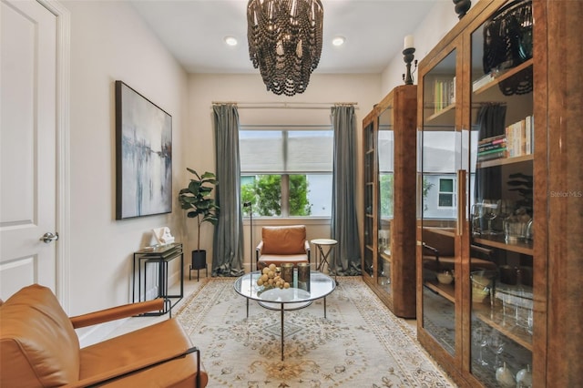 10036 Beachwalk Dr, Englewood, FL 34223 - living area featuring a chandelier, baseboards, and recessed lighting