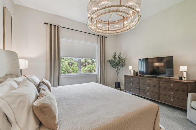 10036 Beachwalk Dr, Englewood, FL 34223 - carpeted bedroom featuring a chandelier