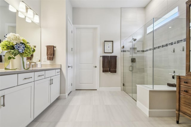 10036 Beachwalk Dr, Englewood, FL 34223 - bathroom with vanity, a stall shower, and baseboards