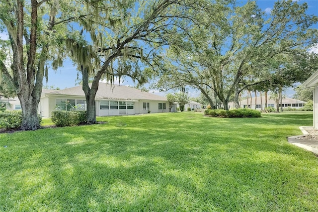 746 Masterpiece Dr, Sun City Center, FL 33573 - view of grassy yard