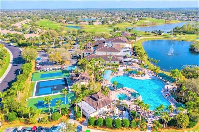 746 Masterpiece Dr, Sun City Center, FL 33573 - drone / aerial view of a large body of water, a pool, and a golf club