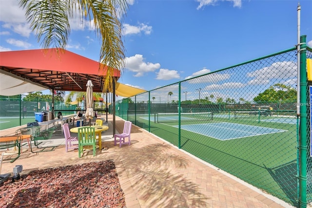 746 Masterpiece Dr, Sun City Center, FL 33573 - view of tennis court featuring a gazebo