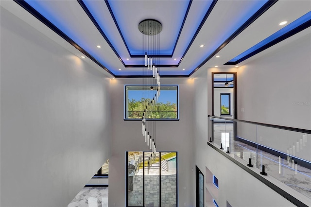 6520 Simone Shores Cir, Apollo Beach, FL 33572 - detailed view of a raised ceiling, a chandelier, and recessed lighting