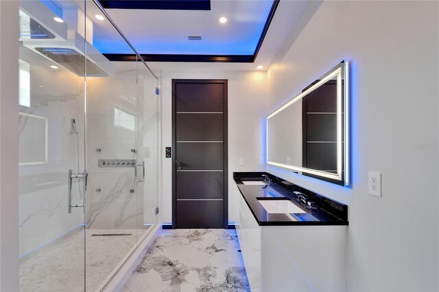 6520 Simone Shores Cir, Apollo Beach, FL 33572 - full bath featuring a marble finish shower, double vanity, marble finish flooring, and recessed lighting