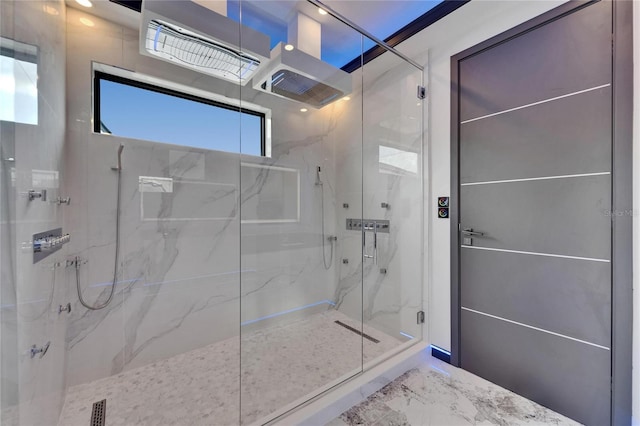 6520 Simone Shores Cir, Apollo Beach, FL 33572 - bathroom featuring a marble finish shower