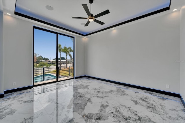 6520 Simone Shores Cir, Apollo Beach, FL 33572 - spare room featuring a raised ceiling, a ceiling fan, baseboards, recessed lighting, and marble finish flooring