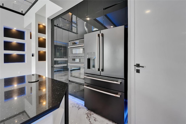 6520 Simone Shores Cir, Apollo Beach, FL 33572 - kitchen featuring stainless steel appliances, marble tiled flooring, and dark stone counters