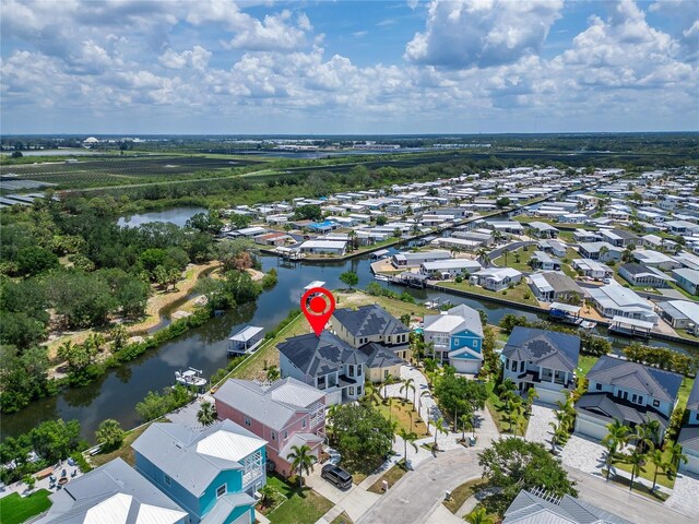 6520 Simone Shores Cir, Apollo Beach, FL 33572 - aerial perspective of suburban area with a nearby body of water