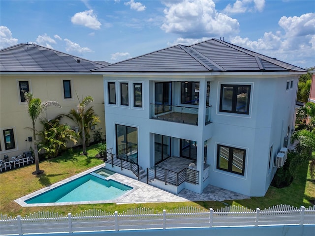 6520 Simone Shores Cir, Apollo Beach, FL 33572 - back of house with stucco siding and a patio area