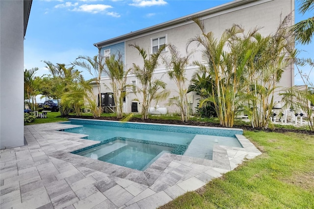 6526 Simone Shores Cir, Apollo Beach, FL 33572 - outdoor pool with an in-ground hot tub, a lawn, and a patio