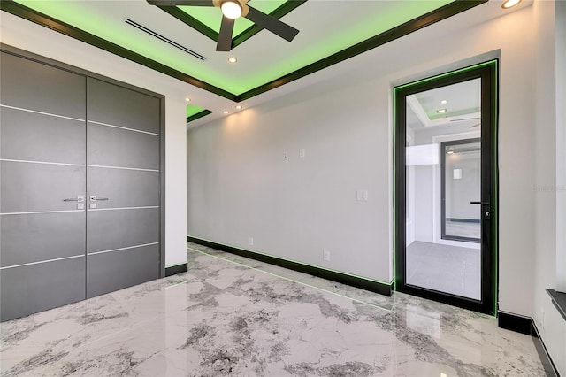 6526 Simone Shores Cir, Apollo Beach, FL 33572 - unfurnished bedroom with baseboards, marble tiled floors, a closet, and recessed lighting