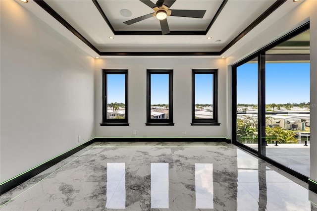 6526 Simone Shores Cir, Apollo Beach, FL 33572 - empty room featuring a raised ceiling, light marble finish flooring, baseboards, a ceiling fan, and recessed lighting