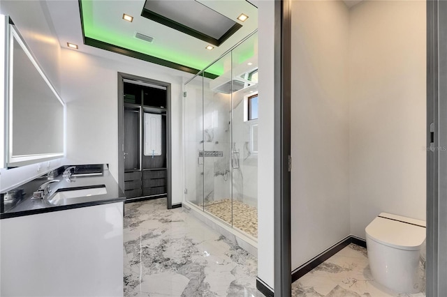6526 Simone Shores Cir, Apollo Beach, FL 33572 - full bathroom with marble tiled flooring, a marble finish shower, double vanity, toilet, and a tray ceiling