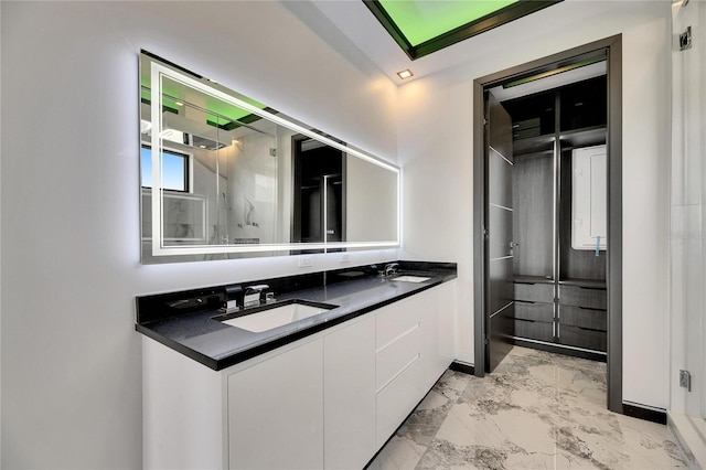 6526 Simone Shores Cir, Apollo Beach, FL 33572 - full bath with marble look tiles, double vanity, and a shower