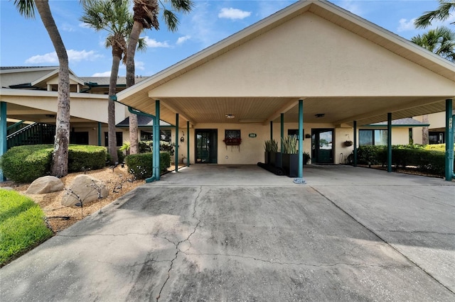 644 Yardarm Dr Unit 22, Apollo Beach, FL 33572 - view of front of house with stucco siding and driveway