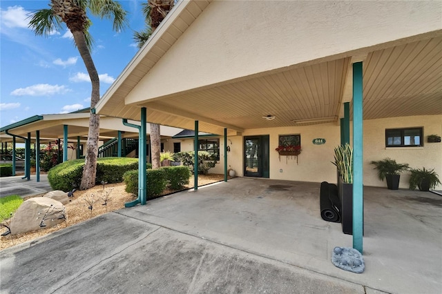 644 Yardarm Dr Unit 22, Apollo Beach, FL 33572 - view of patio / terrace with a carport