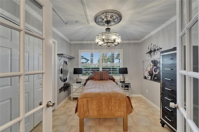 644 Yardarm Dr Unit 22, Apollo Beach, FL 33572 - bedroom featuring a chandelier, light tile patterned floors, crown molding, and baseboards