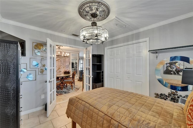 644 Yardarm Dr Unit 22, Apollo Beach, FL 33572 - bedroom featuring a chandelier, a closet, light tile patterned floors, and crown molding