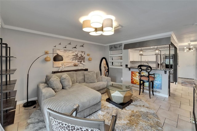 644 Yardarm Dr Unit 22, Apollo Beach, FL 33572 - living room with a chandelier, crown molding, and baseboards