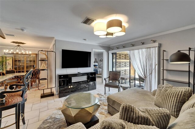 644 Yardarm Dr Unit 22, Apollo Beach, FL 33572 - living room with a chandelier and crown molding