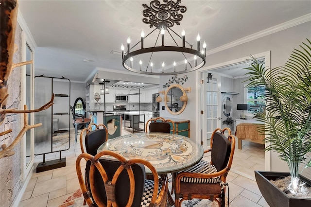 644 Yardarm Dr Unit 22, Apollo Beach, FL 33572 - dining area with a chandelier, crown molding, and baseboards