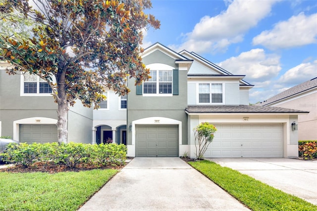 4910 Chatham Gate Drive Dr, Riverview, FL 33578 - view of front of house featuring stucco siding, driveway, and a garage