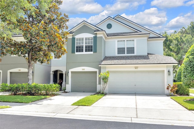 4910 Chatham Gate Drive Dr, Riverview, FL 33578 - view of front of property featuring stucco siding, an attached garage, driveway, and roof with shingles