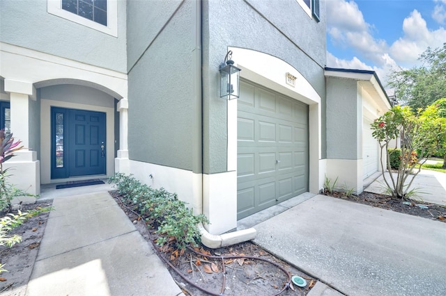 4910 Chatham Gate Drive Dr, Riverview, FL 33578 - view of exterior entry featuring stucco siding and concrete driveway