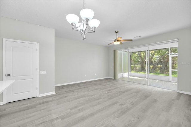 4910 Chatham Gate Drive Dr, Riverview, FL 33578 - unfurnished room with a chandelier, ceiling fan, wood finished floors, and baseboards