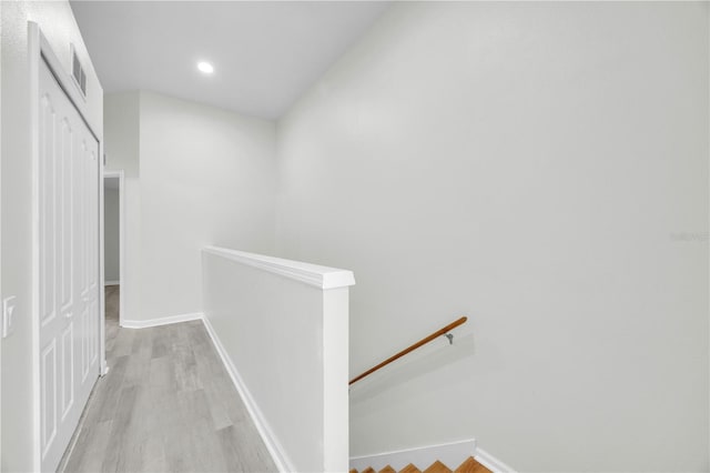 4910 Chatham Gate Drive Dr, Riverview, FL 33578 - hallway featuring an upstairs landing, light wood-type flooring, recessed lighting, and baseboards