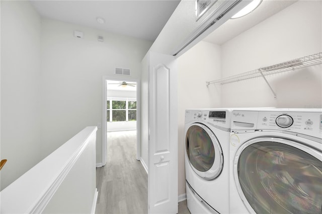 4910 Chatham Gate Drive Dr, Riverview, FL 33578 - laundry room featuring separate washer and dryer, light wood-type flooring, ceiling fan, and baseboards