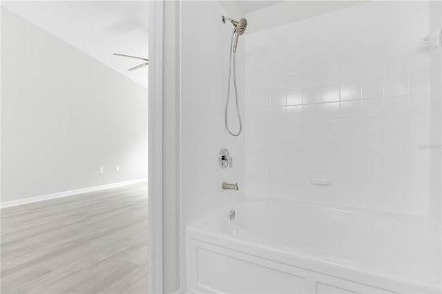 4910 Chatham Gate Drive Dr, Riverview, FL 33578 - full bath featuring bathing tub / shower combination, wood finished floors, and baseboards
