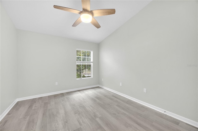 4910 Chatham Gate Drive Dr, Riverview, FL 33578 - empty room featuring wood finished floors, a ceiling fan, vaulted ceiling, and baseboards